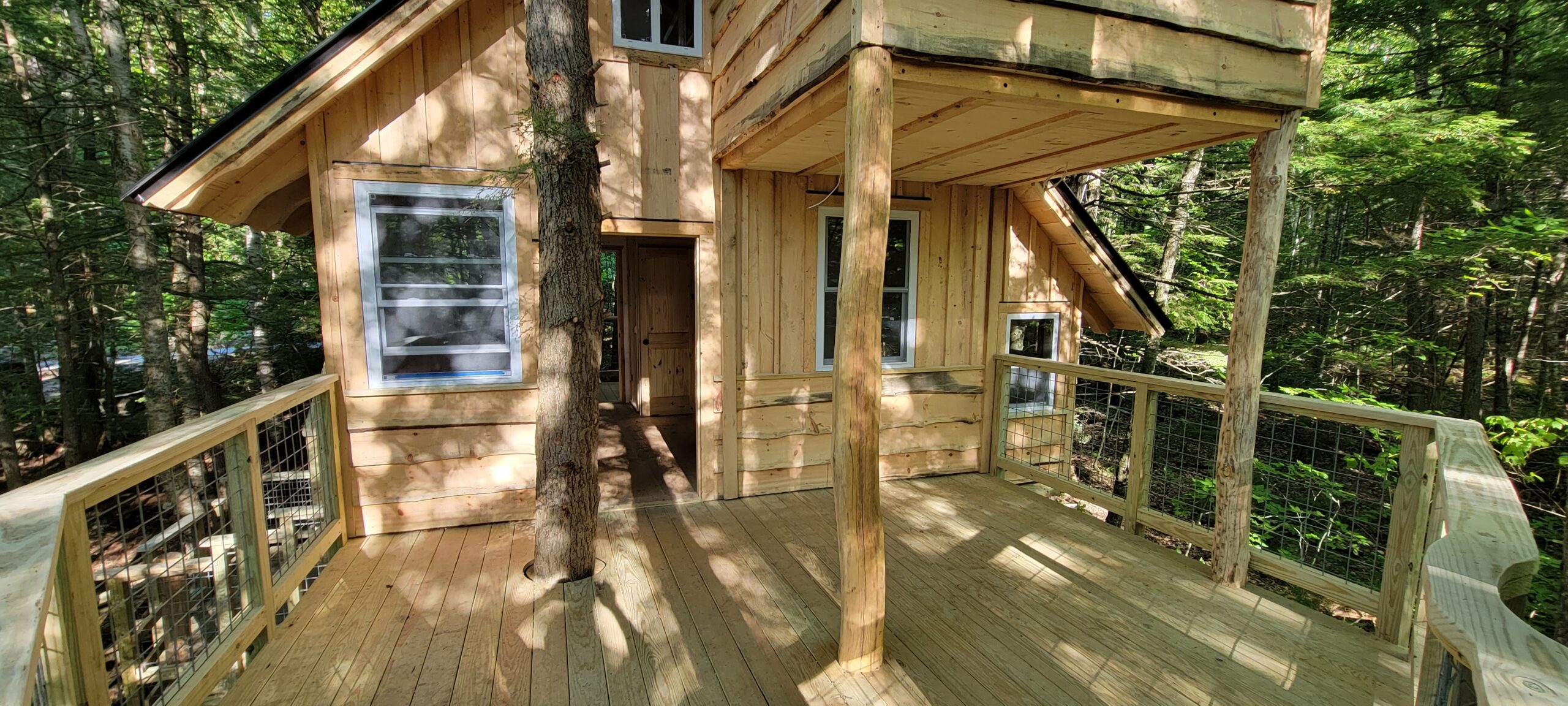 This luxury treehouse rental provides the perfect outdoor space for year-round enjoyment!